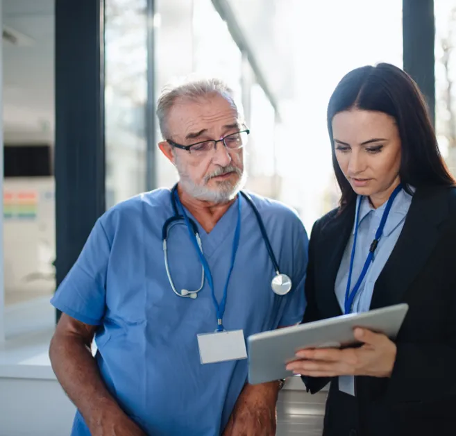 Medical provider talking with professional